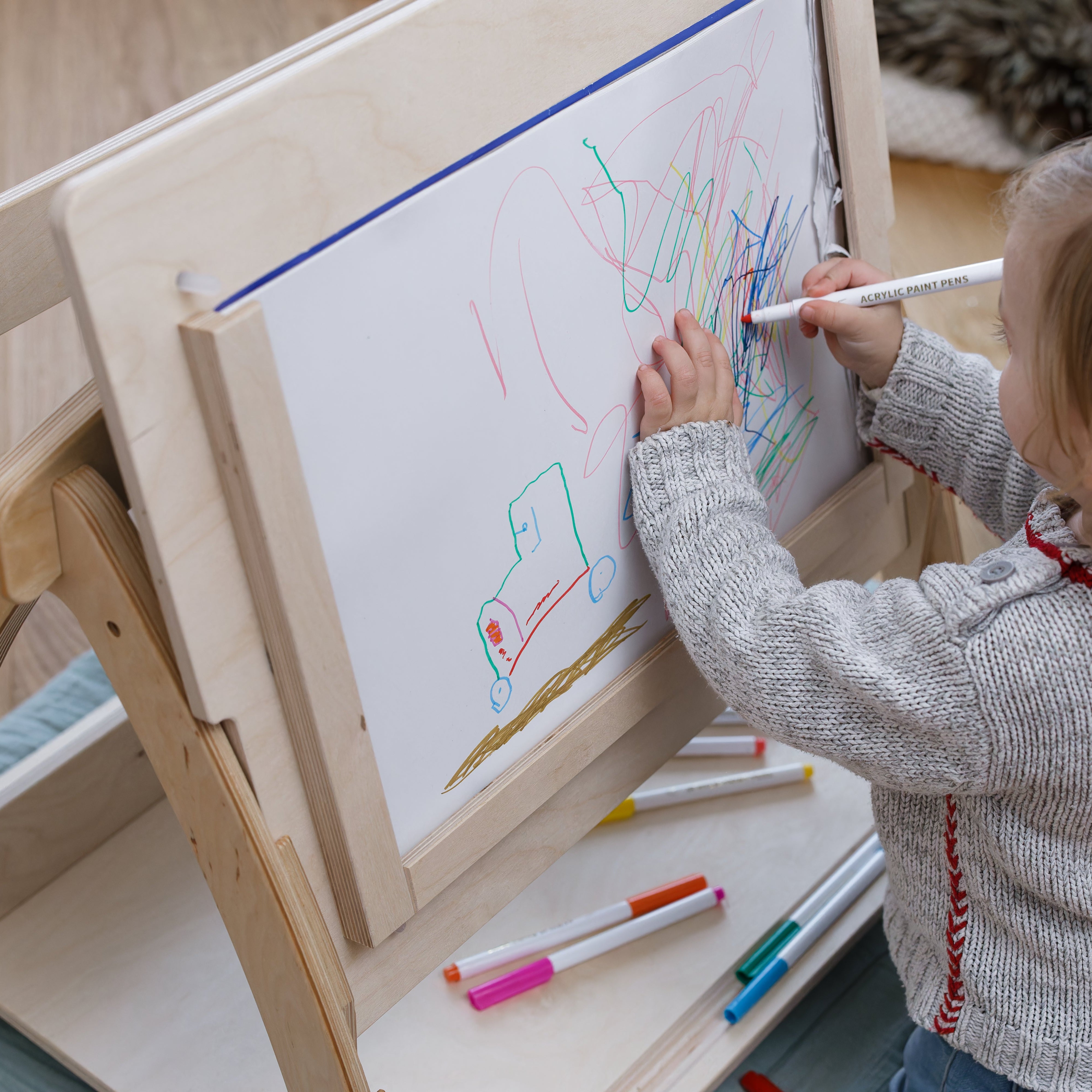 Kind malt Spielbogen